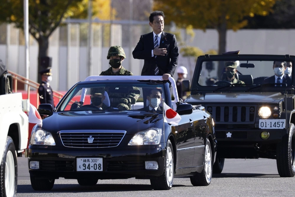 Prime minister Fumio Kishida reviews Japan Self-Defense Forces troops at Camp Asaka in Tokyo in November 2021.  Prime minister Fumio Kishida reviews Japan Self-Defense Forces troops at Camp Asaka in Tokyo in November 2021.