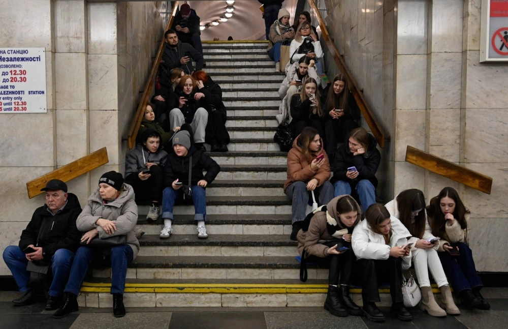 People take shelter in a subway station in Kyiv amid a Russian missile attack on Friday.  People take shelter in a subway station in Kyiv amid a Russian missile attack on Friday.