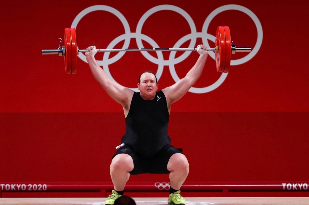Laurel Hubbard of New Zealand, the first openly transgender female Olympian, competes at the Tokyo Games in August 2021.  Laurel Hubbard of New Zealand, the first openly transgender female Olympian, competes at the Tokyo Games in August 2021.