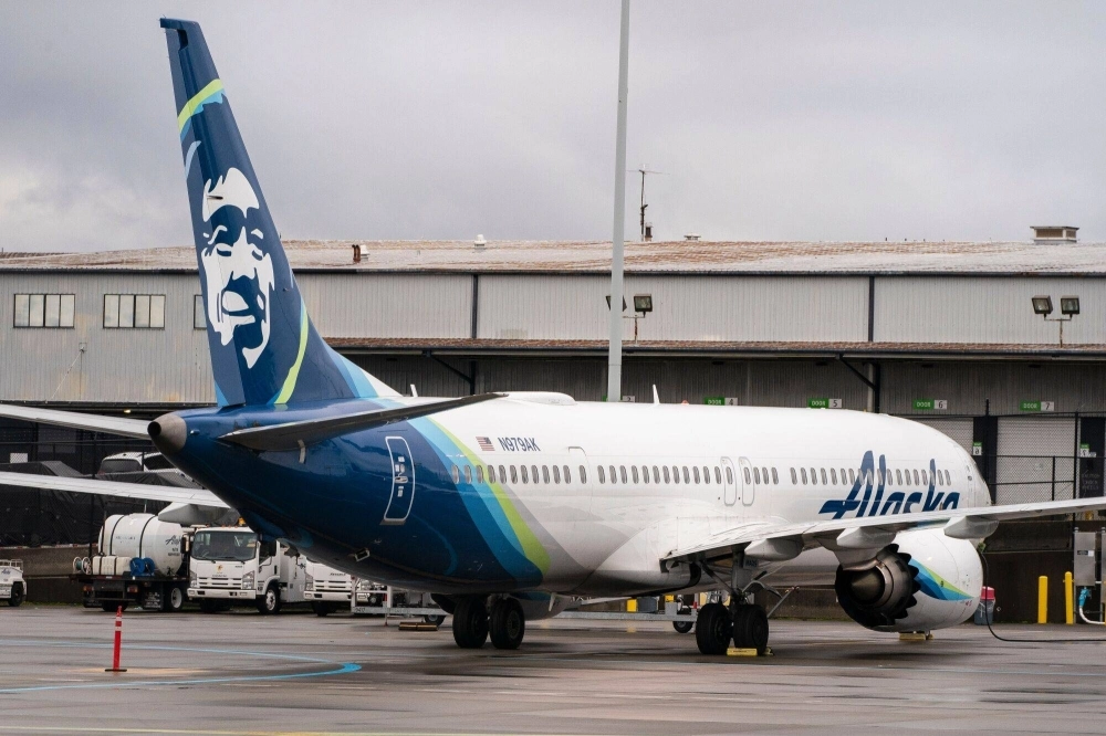 An Alaska Airlines Boeing 737 Max 9 is grounded at Seattle-Tacoma International Airport on Saturday.  An Alaska Airlines Boeing 737 Max 9 is grounded at Seattle-Tacoma International Airport on Saturday.