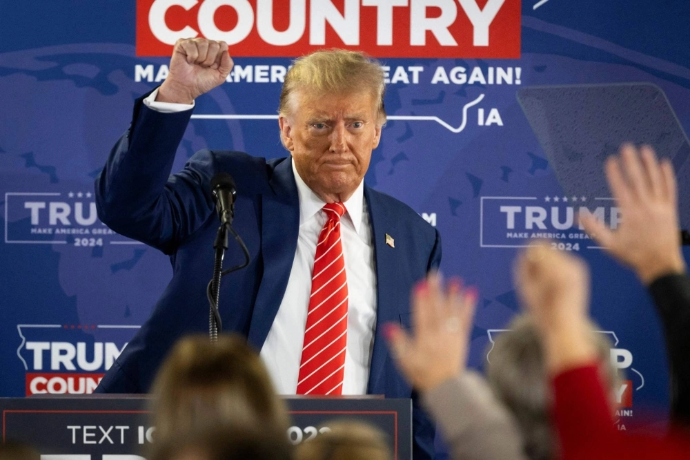 Former U.S. President and Republican presidential hopeful Donald Trump speaks during a rally in Newton, Iowa, on Saturday.  Former U.S. President and Republican presidential hopeful Donald Trump speaks during a rally in Newton, Iowa, on Saturday.