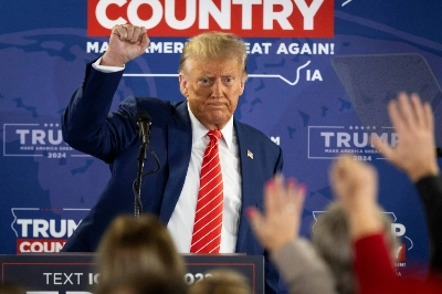 Former U.S. President and Republican presidential hopeful Donald Trump speaks during a rally in Newton, Iowa, on Saturday.  Former U.S. President and Republican presidential hopeful Donald Trump speaks during a rally in Newton, Iowa, on Saturday.