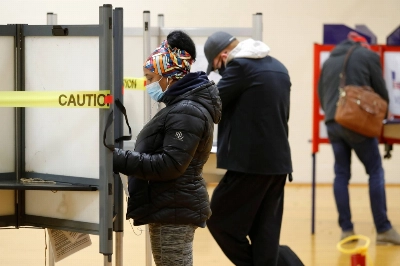 Voters cast ballots for the U.S. presidential election at a polling station in Portland, Maine, on Nov. 3, 2020. Voters cast ballots for the U.S. presidential election at a polling station in Portland, Maine, on Nov. 3, 2020.