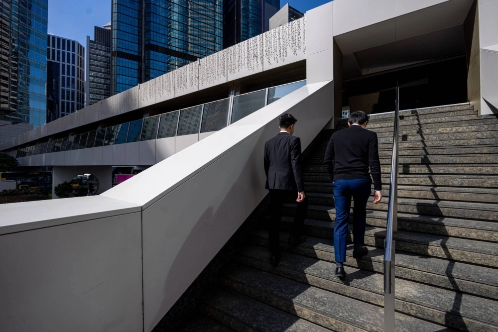 Office workers in the Central district in Hong Kong on Nov. 20 Office workers in the Central district in Hong Kong on Nov. 20
