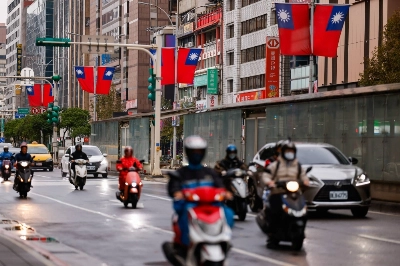Taiwan flags adorn the streets of Taipei on Wednesday. Taiwan flags adorn the streets of Taipei on Wednesday.