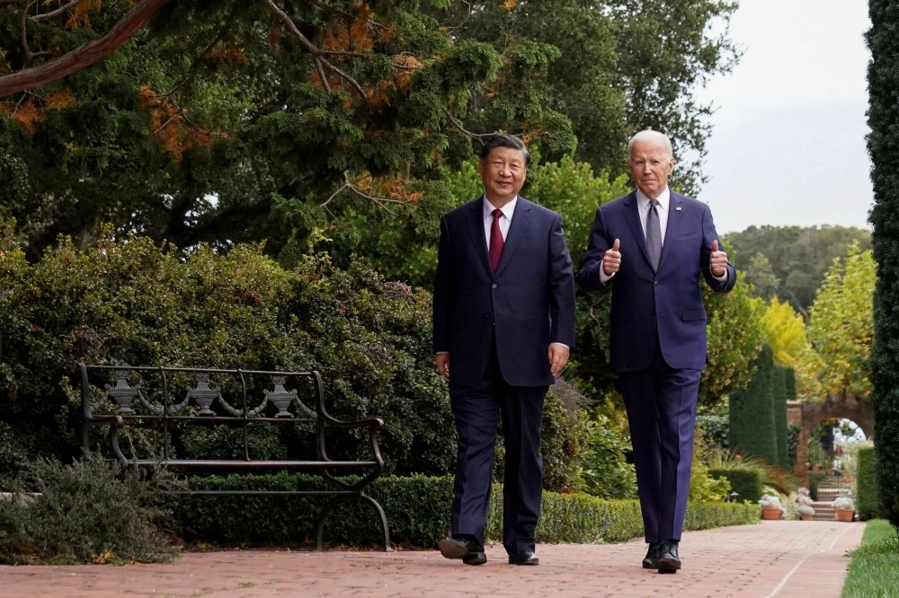U.S. President Joe Biden gives a thumbs-up as he walks with Chinese leader Xi Jinping at Filoli estate on the sidelines of the Asia-Pacific Economic Cooperation summit, in Woodside, California, on Nov. 15. Their meeting attempted to calm the waters and tried to convey a sense that the U.S. and China could effectively manage their differences. U.S. President Joe Biden gives a thumbs-up as he walks with Chinese leader Xi Jinping at Filoli estate on the sidelines of the Asia-Pacific Economic Cooperation summit, in Woodside, California, on Nov. 15. Their meeting attempted to calm the waters and tried to convey a sense that the U.S. and China could effectively manage their differences.