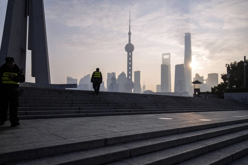 Security guards along the Bund in front of buildings in the Lujiazui Financial District in Shanghai on Tuesday. The pivot away from China may accelerate as positive catalysts are missing at a time when the U.S. Federal Reserve shifts toward monetary easing. Security guards along the Bund in front of buildings in the Lujiazui Financial District in Shanghai on Tuesday. The pivot away from China may accelerate as positive catalysts are missing at a time when the U.S. Federal Reserve shifts toward monetary easing.
