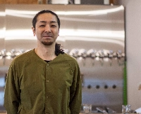 Hiromi Uetake founded his craft beer brewery, Brassiere Knot, inside a shuttered elementary school in eastern Hokkaido. | JUSTIN RANDALL