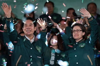 Taiwan President-elect Lai Ching-te and his running mate, Hsiao Bi-khim, attend a rally outside the headquarters of the Democratic Progressive Party in Taipei on Saturday night after winning the presidential election.  Taiwan President-elect Lai Ching-te and his running mate, Hsiao Bi-khim, attend a rally outside the headquarters of the Democratic Progressive Party in Taipei on Saturday night after winning the presidential election.