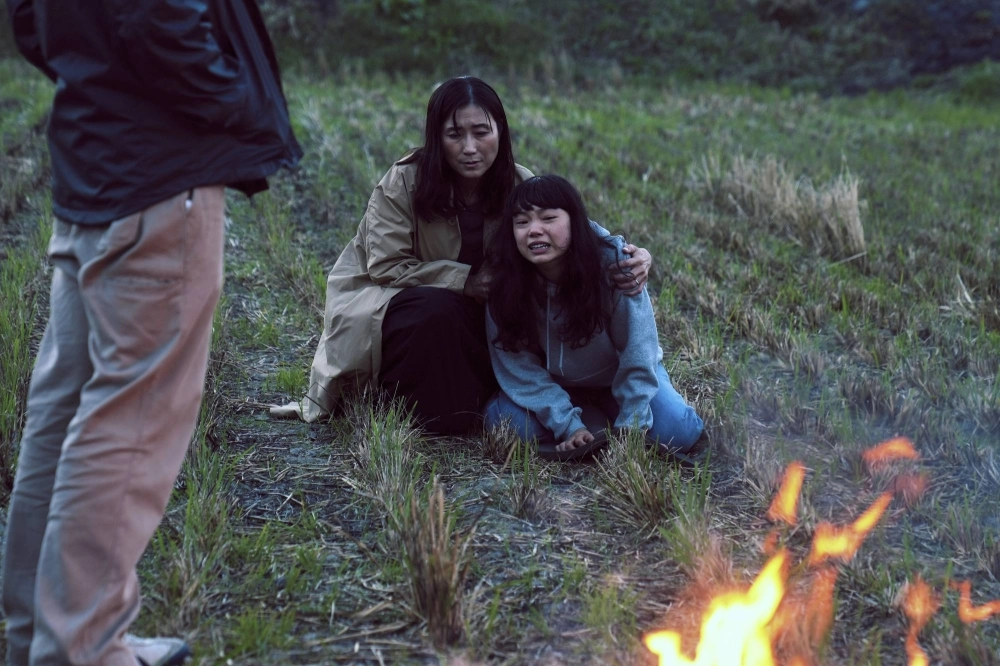 A nursing student (Kotone Furukawa, right) is terrified by the bizarre goings-on in her hometown in “Best Wishes to All.” A nursing student (Kotone Furukawa, right) is terrified by the bizarre goings-on in her hometown in “Best Wishes to All.”