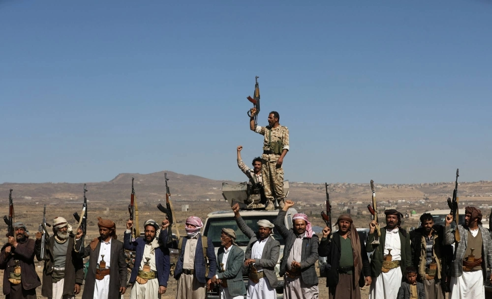 Houthi fighters and tribal supporters hold up firearms during a protest against recent U.S.-led strikes on Houthi targets, near Sanaa, Yemen, on Sunday. Houthi fighters and tribal supporters hold up firearms during a protest against recent U.S.-led strikes on Houthi targets, near Sanaa, Yemen, on Sunday.