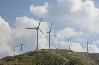 Wind turbines at a wind farm in the village of Nishihara, Kumamoto Prefecture. New wind projects continue to be announced as Japan moves forward to meet its goal of having the renewable resource make up 5% of its energy mix by 2030.  | Jiji