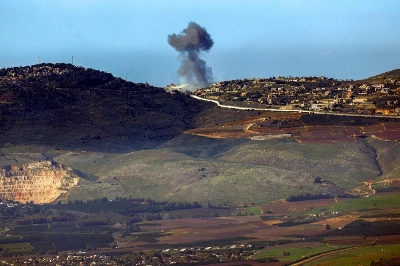 Smoke billows over the Lebanese village of Odaisseh on Saturday during Israeli bombardment amid cross-border tensions in the Middle East.  Smoke billows over the Lebanese village of Odaisseh on Saturday during Israeli bombardment amid cross-border tensions in the Middle East.