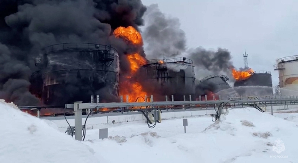 Local authorities say oil tanks at this storage facility caught fire after the military brought down a Ukrainian drone, in the town of Klintsy in the Bryansk Region, Russia, on Friday. Local authorities say oil tanks at this storage facility caught fire after the military brought down a Ukrainian drone, in the town of Klintsy in the Bryansk Region, Russia, on Friday.