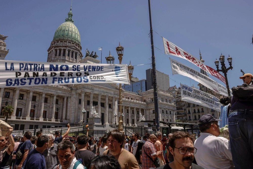 Protesters during a nationwide strike near the National Congress in Buenos Aires on Wednesday. Argentina's labor movement is staging a general strike that will test popular support for President Javier Milei's austerity blitz less than two months into his presidency.  Protesters during a nationwide strike near the National Congress in Buenos Aires on Wednesday. Argentina's labor movement is staging a general strike that will test popular support for President Javier Milei's austerity blitz less than two months into his presidency.