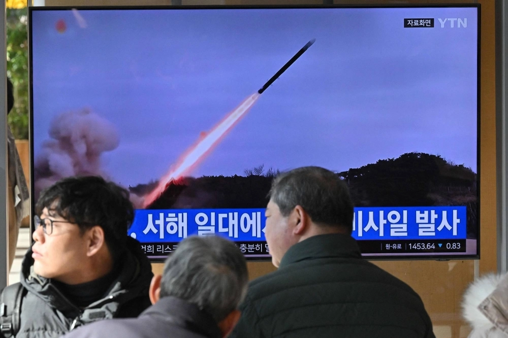 A news broadcast shows a North Korean missile test at the main railway station in Seoul on Wednesday. A news broadcast shows a North Korean missile test at the main railway station in Seoul on Wednesday.