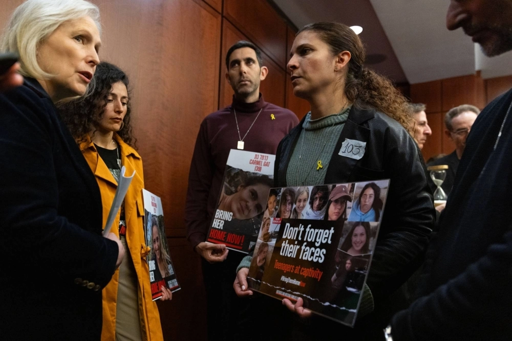 New York Senator Kirsten Gillibrand (left) speak with relatives of hostages taken by Hamas during the militant group’s Oct. 7 attack on Israel, in Washington on Jan. 17. Gillibrand was one of Saudi Crown Prince Mohammed Bin Salman's guests at discussions that took place in earlier this month. New York Senator Kirsten Gillibrand (left) speak with relatives of hostages taken by Hamas during the militant group’s Oct. 7 attack on Israel, in Washington on Jan. 17. Gillibrand was one of Saudi Crown Prince Mohammed Bin Salman's guests at discussions that took place in earlier this month.