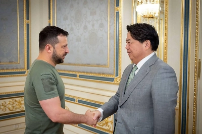 Ukraine's President Volodymyr Zelenskyy shakes hands with then-Foreign Minister Yoshimasa Hayashi prior to their meeting in Kyiv in September. Ukraine's President Volodymyr Zelenskyy shakes hands with then-Foreign Minister Yoshimasa Hayashi prior to their meeting in Kyiv in September.