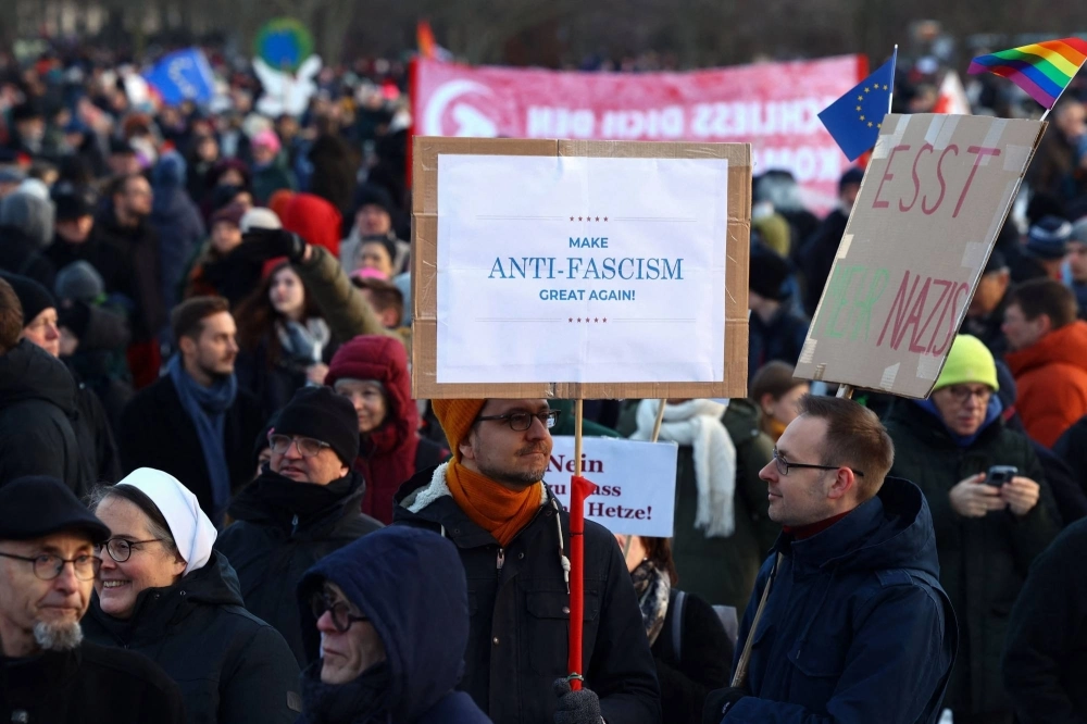 A demonstration against racism and far-right groups, including the Alternative for Germany party, is held in Berlin on Jan. 21. A demonstration against racism and far-right groups, including the Alternative for Germany party, is held in Berlin on Jan. 21.
