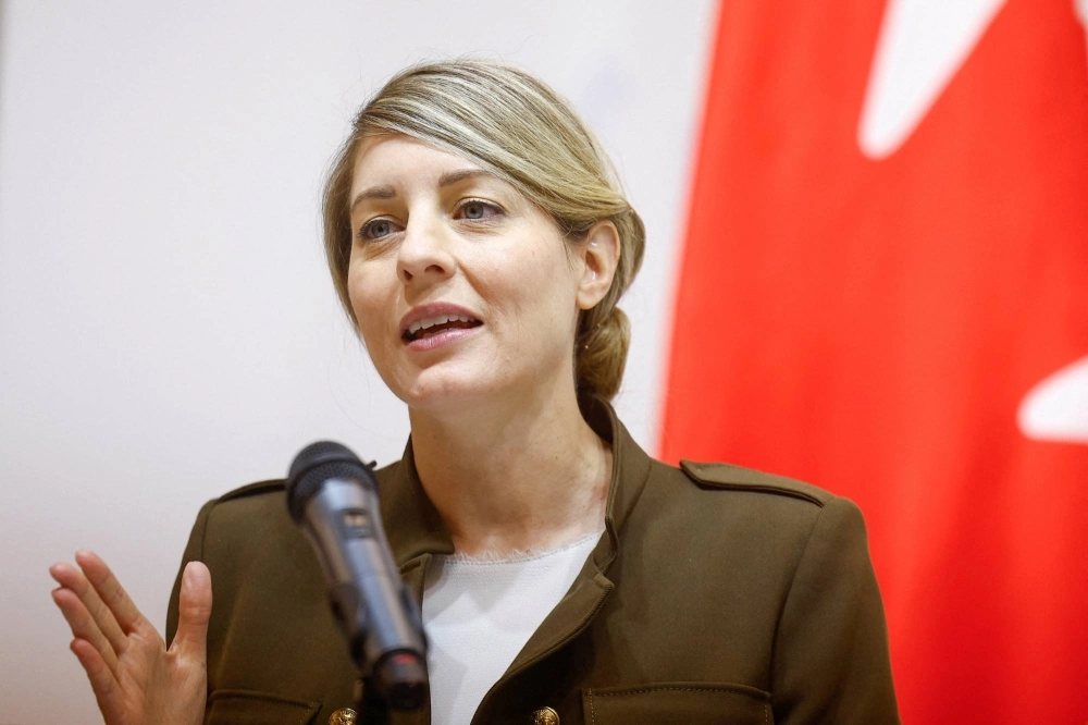 Canadian Foreign Minister Melanie Joly said she had also spoken to her Chinese counterpart Wang Yi about making sure that Western sanctions against Russia held as the war in Ukraine dragged on. Canadian Foreign Minister Melanie Joly said she had also spoken to her Chinese counterpart Wang Yi about making sure that Western sanctions against Russia held as the war in Ukraine dragged on.