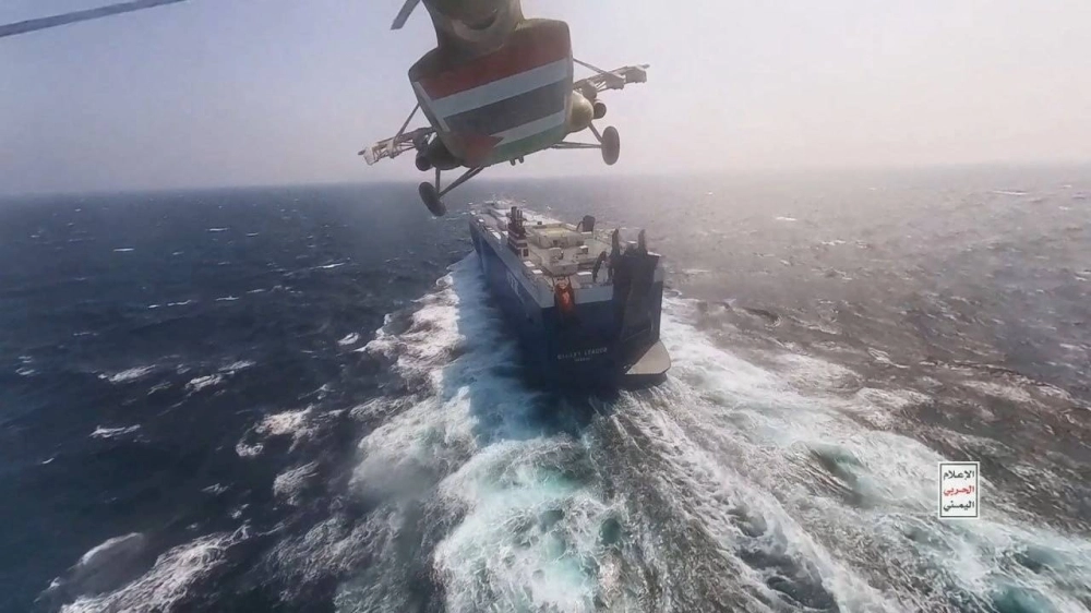 A Houthi military helicopter prepares to land on the Galaxy Leader cargo ship in the Red Sea in November. A Houthi military helicopter prepares to land on the Galaxy Leader cargo ship in the Red Sea in November.