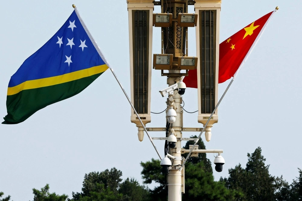 Flags of the Solomon Islands and China near the Tiananmen Gate in Beijing in last July Flags of the Solomon Islands and China near the Tiananmen Gate in Beijing in last July