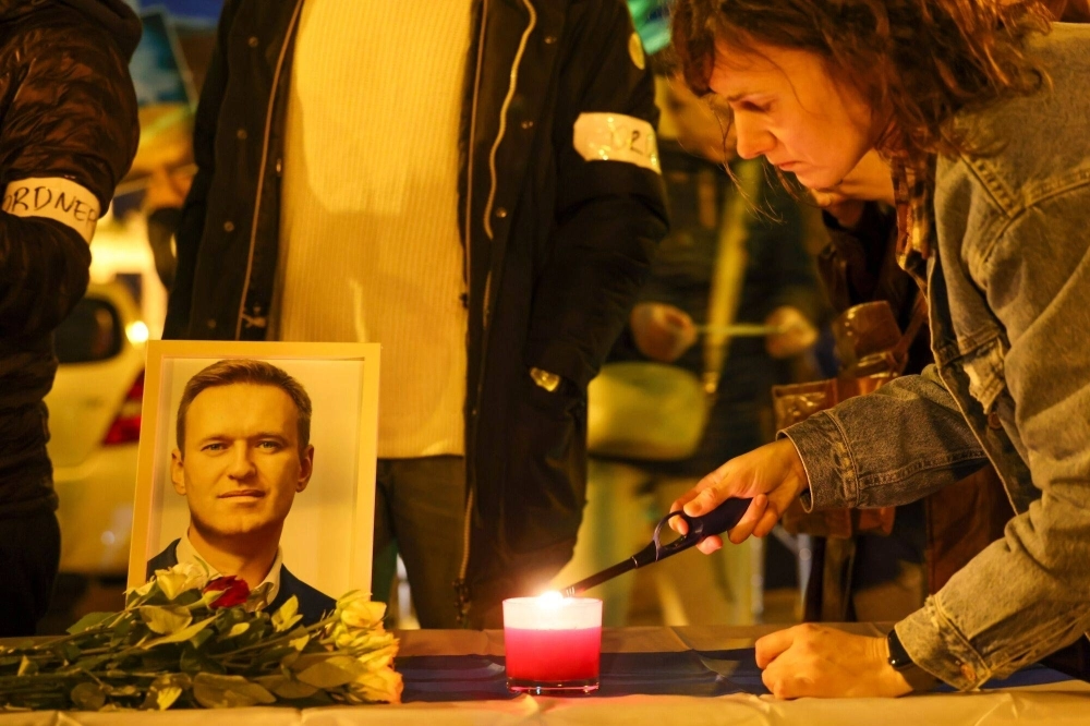 A vigil is held for Russian activist Alexei Navalny in Munich on Feb. 16. A vigil is held for Russian activist Alexei Navalny in Munich on Feb. 16.