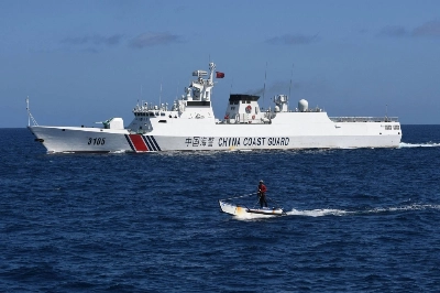 A Chinese coast guard ship near the China-controlled Scarborough Shoal, in disputed waters of the South China Sea on Feb. 16.  A Chinese coast guard ship near the China-controlled Scarborough Shoal, in disputed waters of the South China Sea on Feb. 16.