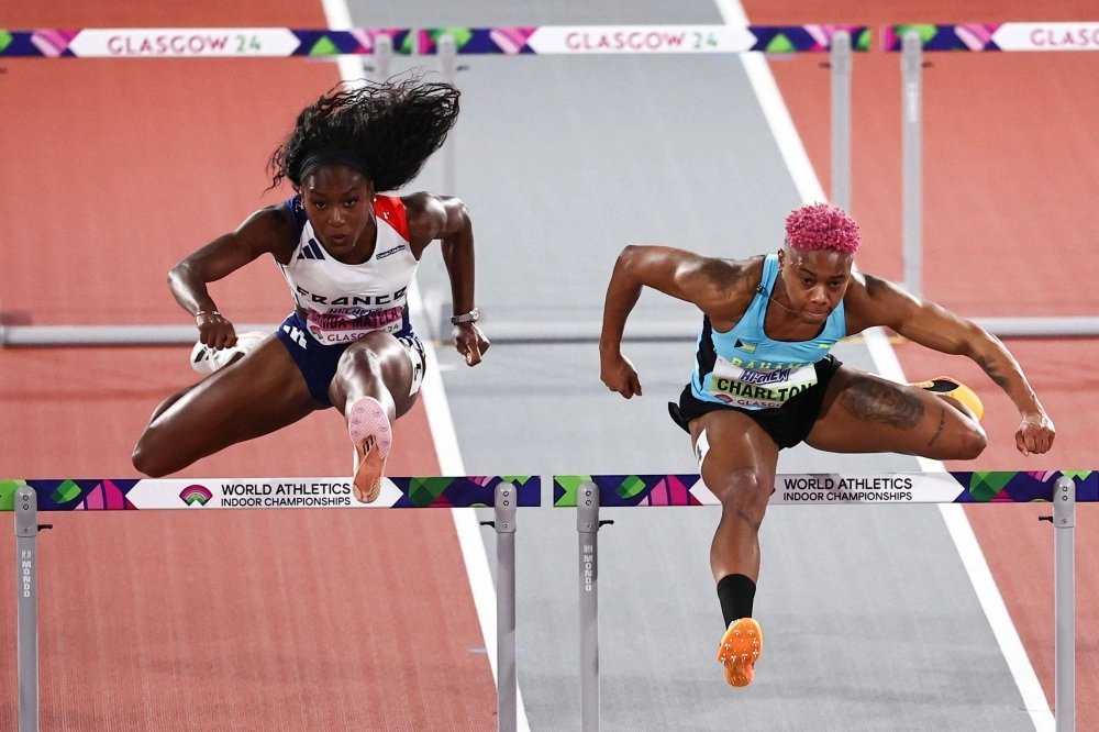 France's Cyrena Samba-Mayela (left) and Bahamas' Devynne Charlton compete in the Women's 60-meters hurdles final during the world indoor athletics championships in Glasgow, Scotland, on Sunday. France's Cyrena Samba-Mayela (left) and Bahamas' Devynne Charlton compete in the Women's 60-meters hurdles final during the world indoor athletics championships in Glasgow, Scotland, on Sunday.