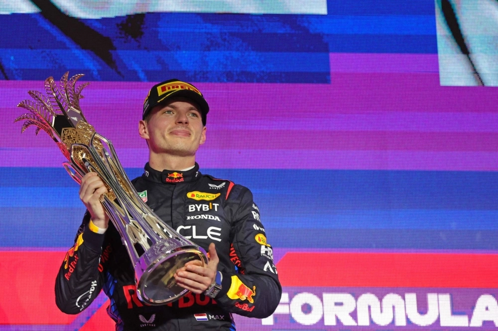 Red Bull's Max Verstappen celebrates his win following the Saudi Arabian Grand Prix on Saturday in Jeddah.  Red Bull's Max Verstappen celebrates his win following the Saudi Arabian Grand Prix on Saturday in Jeddah.