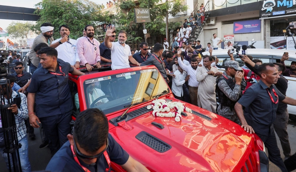Rahul Gandhi, a senior leader of India's main opposition Indian National Congress Party, waves to supporters earlier this month as he takes part in 66-day long political tour across the country. Opposition parties have accused the Modi government of using federal law enforcement agencies to target them. Rahul Gandhi, a senior leader of India's main opposition Indian National Congress Party, waves to supporters earlier this month as he takes part in 66-day long political tour across the country. Opposition parties have accused the Modi government of using federal law enforcement agencies to target them.