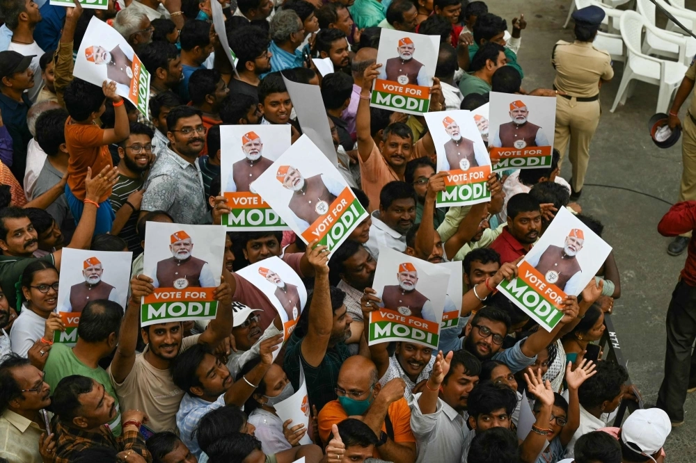 Supporters await the arrival of Indian Prime Minister Narendra Modi at a campaign event in Hyderabad on Friday.  Supporters await the arrival of Indian Prime Minister Narendra Modi at a campaign event in Hyderabad on Friday.
