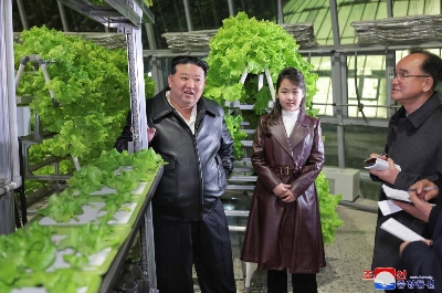 North Korean leader Kim Jong Un and his daughter visit the Gangdong Comprehensive Greenhouse in Pyongyang. North Korean leader Kim Jong Un and his daughter visit the Gangdong Comprehensive Greenhouse in Pyongyang.