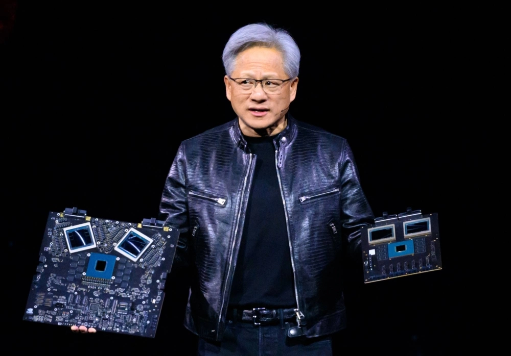 Nvidia's CEO Jensen Huang displays products onstage during the annual Nvidia GTC Artificial Intelligence Conference at SAP Center in San Jose, California, on Monday. Nvidia's CEO Jensen Huang displays products onstage during the annual Nvidia GTC Artificial Intelligence Conference at SAP Center in San Jose, California, on Monday.