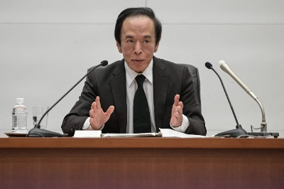 Bank of Japan Gov. Kazuo Ueda speaks during a news conference on Tuesday after the central bank ended its ultra-aggressive monetary stimulus program and scrapped the world's last negative interest rate.  
 Bank of Japan Gov. Kazuo Ueda speaks during a news conference on Tuesday after the central bank ended its ultra-aggressive monetary stimulus program and scrapped the world's last negative interest rate.
