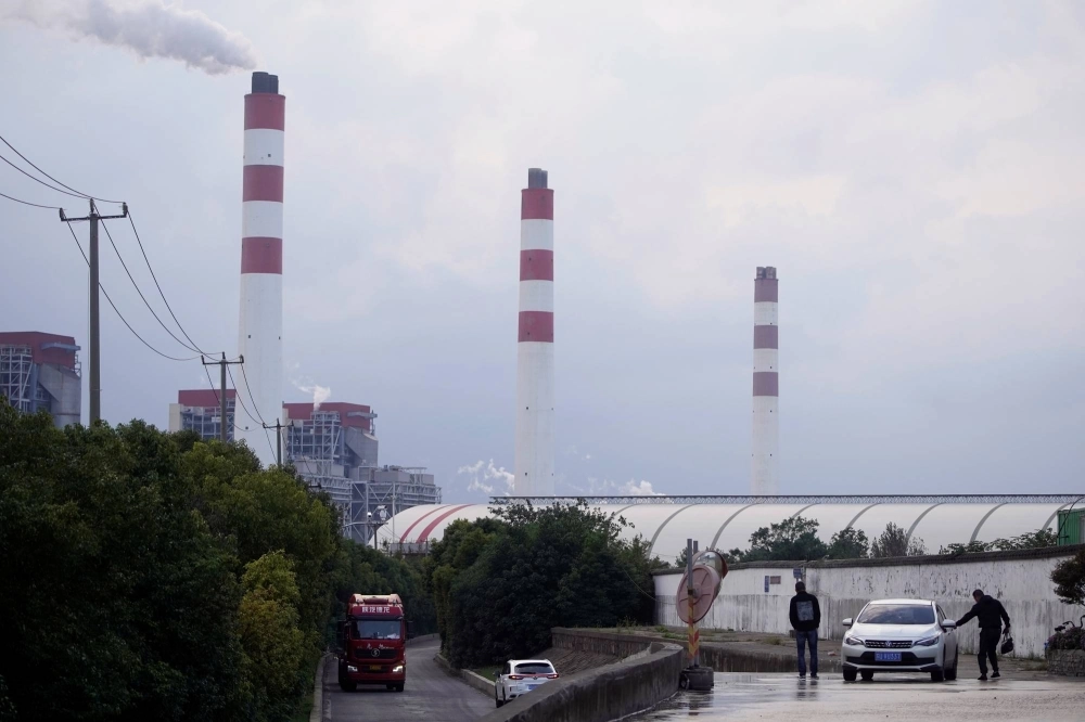 A coal-fired power plant in Shanghai in October 2021. For years, analysts expected coal production to plateau after it hit a then-record in 2013. Then came 2021, when power shortages in China set Beijing on a path to order more mining to ensure energy security. A coal-fired power plant in Shanghai in October 2021. For years, analysts expected coal production to plateau after it hit a then-record in 2013. Then came 2021, when power shortages in China set Beijing on a path to order more mining to ensure energy security.