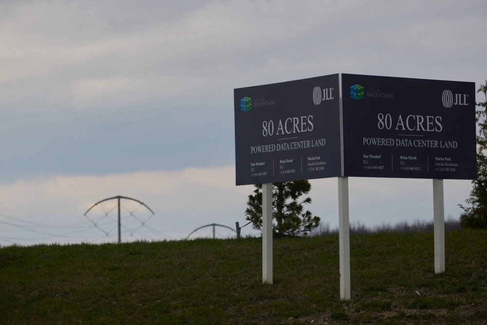A real estate sign advertises powered data center land for sale in Johnstown, Ohio, on March 23.  A real estate sign advertises powered data center land for sale in Johnstown, Ohio, on March 23.