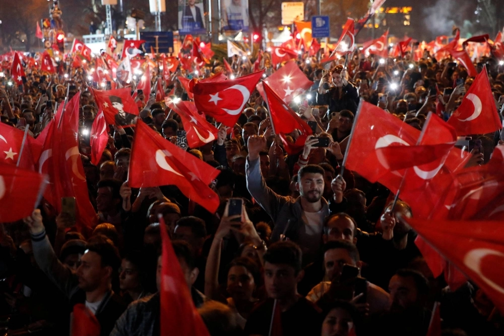 Supporters of Istanbul Mayor Ekrem Imamoglu, mayoral candidate of the main opposition Republican People's Party (CHP), celebrate following early results in front of the Istanbul Metropolitan Municipality in Istanbul on April 1. Supporters of Istanbul Mayor Ekrem Imamoglu, mayoral candidate of the main opposition Republican People's Party (CHP), celebrate following early results in front of the Istanbul Metropolitan Municipality in Istanbul on April 1.