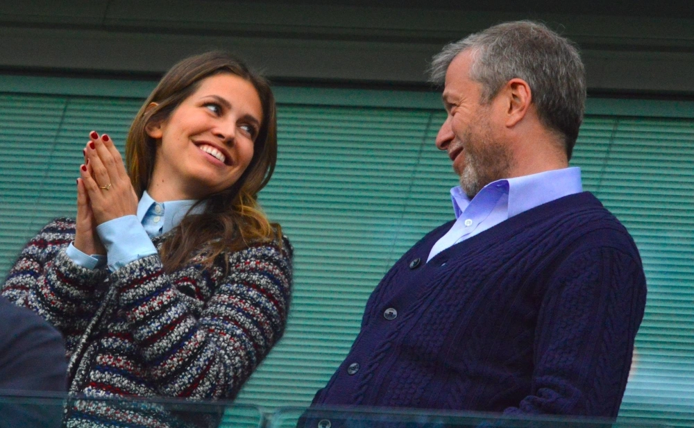 Russian oligarch Roman Abramovich (right) with then-wife Dasha Zhukova in 2014. Zhukova's mother, Elena Zhukova, is engaged to media mogul Rupert Murdoch. Russian oligarch Roman Abramovich (right) with then-wife Dasha Zhukova in 2014. Zhukova's mother, Elena Zhukova, is engaged to media mogul Rupert Murdoch.