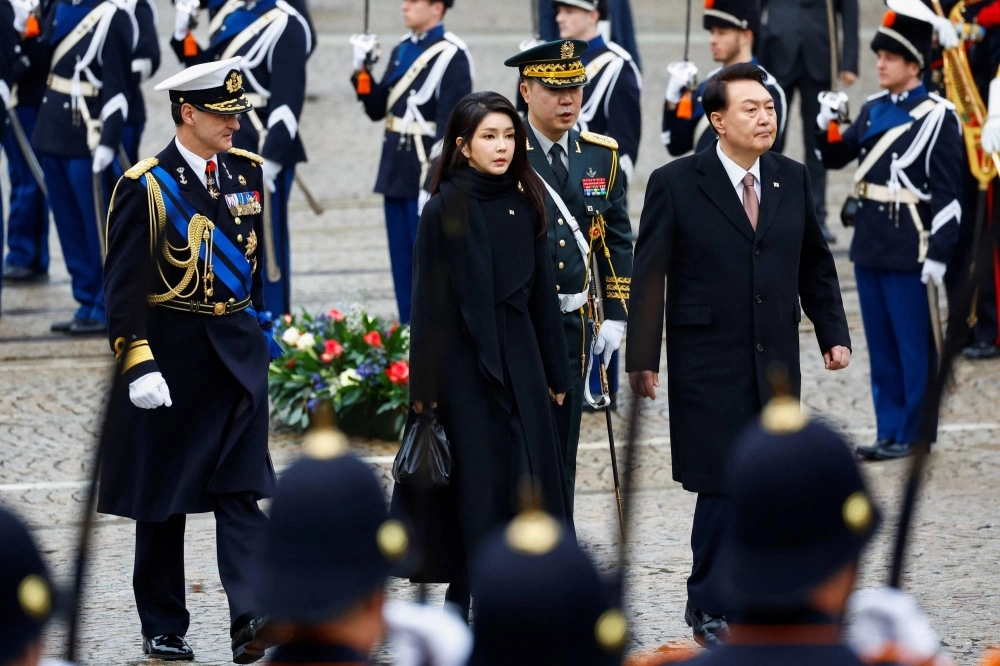 South Korea's President Yoon Suk Yeol and his wife Kim Keon Hee during a ceremony in Amsterdam on Dec. 12, 2023 South Korea's President Yoon Suk Yeol and his wife Kim Keon Hee during a ceremony in Amsterdam on Dec. 12, 2023