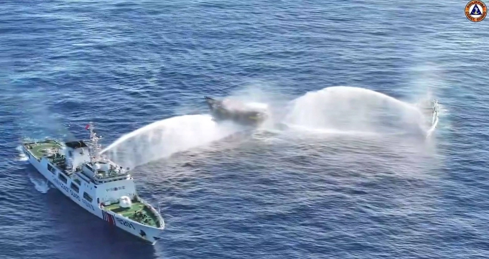 Chinese Coast Guard ships fire water cannons at a Philippine boat during a supply mission near Second Thomas Shoal in the disputed South China Sea on March 5. This incident highlights the danger that such confrontations could have for sparking a wider conflict. Chinese Coast Guard ships fire water cannons at a Philippine boat during a supply mission near Second Thomas Shoal in the disputed South China Sea on March 5. This incident highlights the danger that such confrontations could have for sparking a wider conflict.