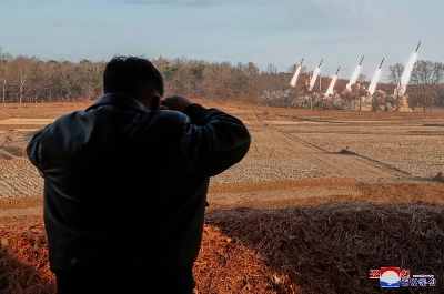 North Korean leader Kim Jong Un looks on as he guides a training of the fire division in this picture released on March 19. Pyongyang has spent decades stockpiling millions of rounds of artillery and thousands of rockets in the terrain north of the demilitarized zone, which sits some 40 kilometers away from Seoul. North Korean leader Kim Jong Un looks on as he guides a training of the fire division in this picture released on March 19. Pyongyang has spent decades stockpiling millions of rounds of artillery and thousands of rockets in the terrain north of the demilitarized zone, which sits some 40 kilometers away from Seoul.