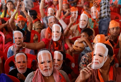 Supporters of India's Prime Minister Narendra Modi wear masks of his face at an election campaign rally in the city of Meerut, in the Indian state of Uttar Pradesh, on March 31. Supporters of India's Prime Minister Narendra Modi wear masks of his face at an election campaign rally in the city of Meerut, in the Indian state of Uttar Pradesh, on March 31.