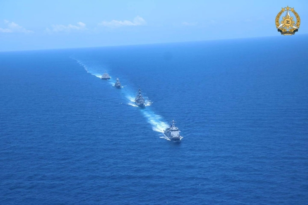 Philippine, Australian, Japanese and U.S. warships take part in the four nations' first-ever joint military drills in the South China Sea on Sunday.  Philippine, Australian, Japanese and U.S. warships take part in the four nations' first-ever joint military drills in the South China Sea on Sunday.