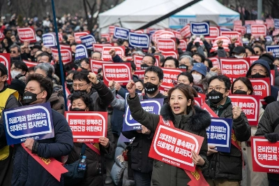 Demonstrators protest against a government plan to increase the number of seats at medical schools in Seoul in March. Demonstrators protest against a government plan to increase the number of seats at medical schools in Seoul in March.