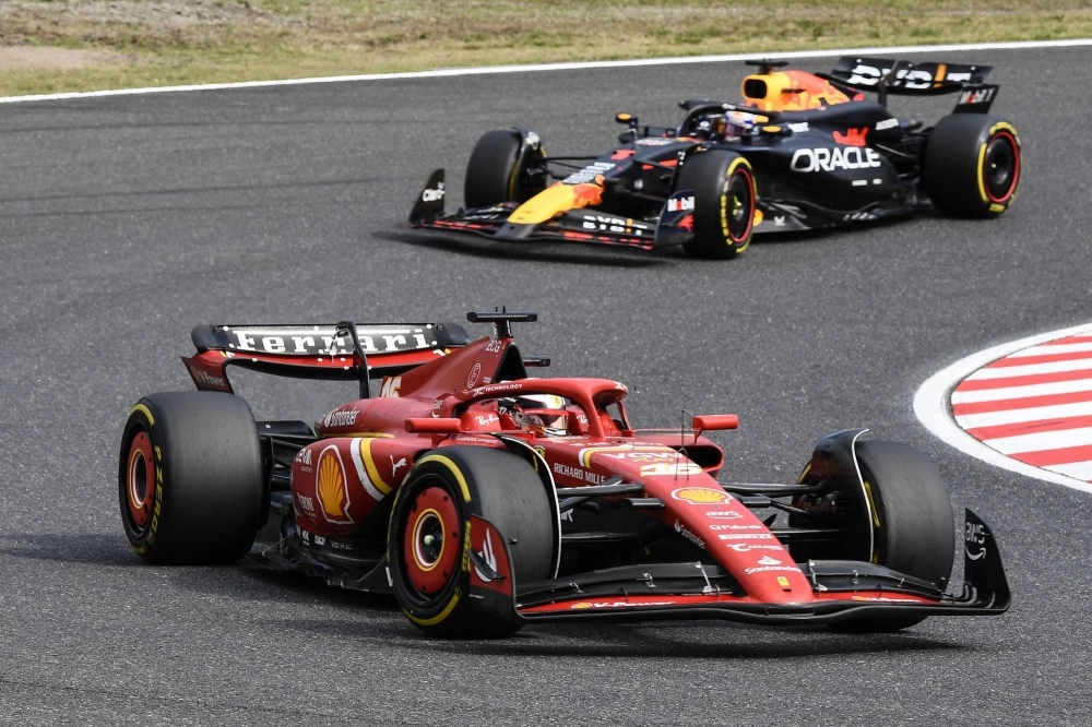 Ferrari driver Charles Leclerc (front) and Red Bull Racing's Max Verstappen during the Formula One Japanese Grand Prix in Suzuka, Mie Prefecture, on Sunday Ferrari driver Charles Leclerc (front) and Red Bull Racing's Max Verstappen during the Formula One Japanese Grand Prix in Suzuka, Mie Prefecture, on Sunday