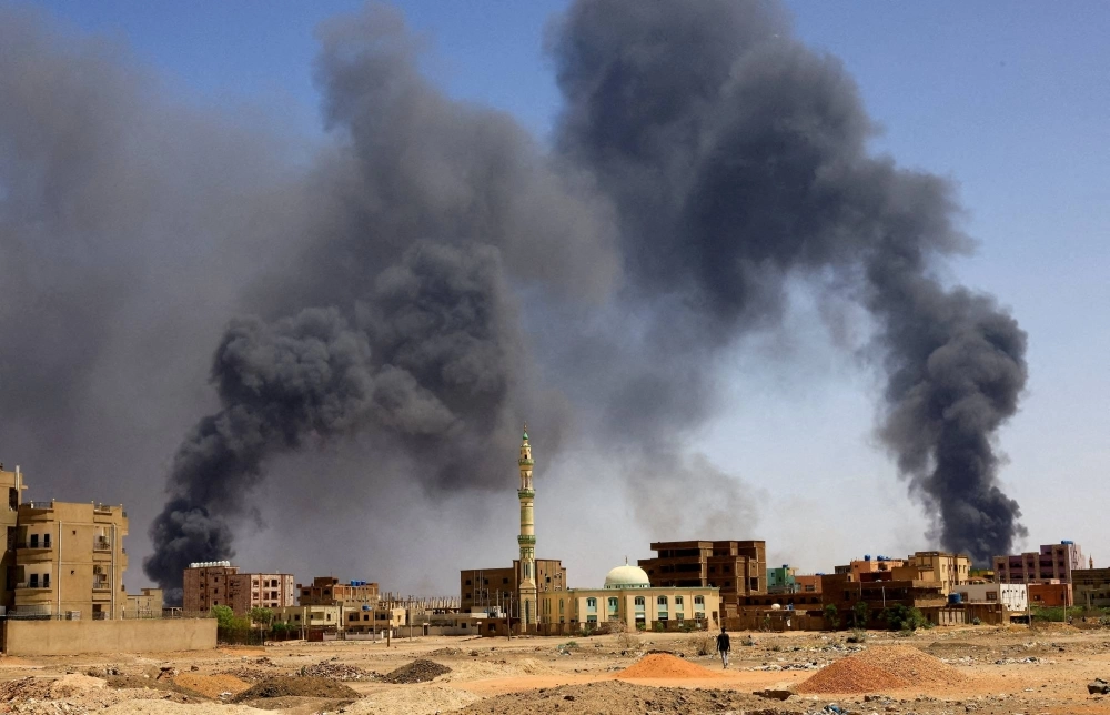 Smoke rising above buildings after an aerial bombardment in Khartoum North, Sudan, in May 2023 Smoke rising above buildings after an aerial bombardment in Khartoum North, Sudan, in May 2023