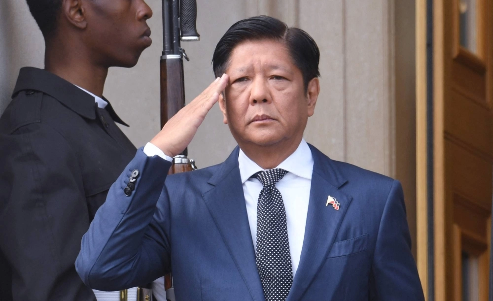 Philippine President Ferdinand Marcos Jr. salutes during a welcome ceremony at the Pentagon in Washington on Friday. Philippine President Ferdinand Marcos Jr. salutes during a welcome ceremony at the Pentagon in Washington on Friday.