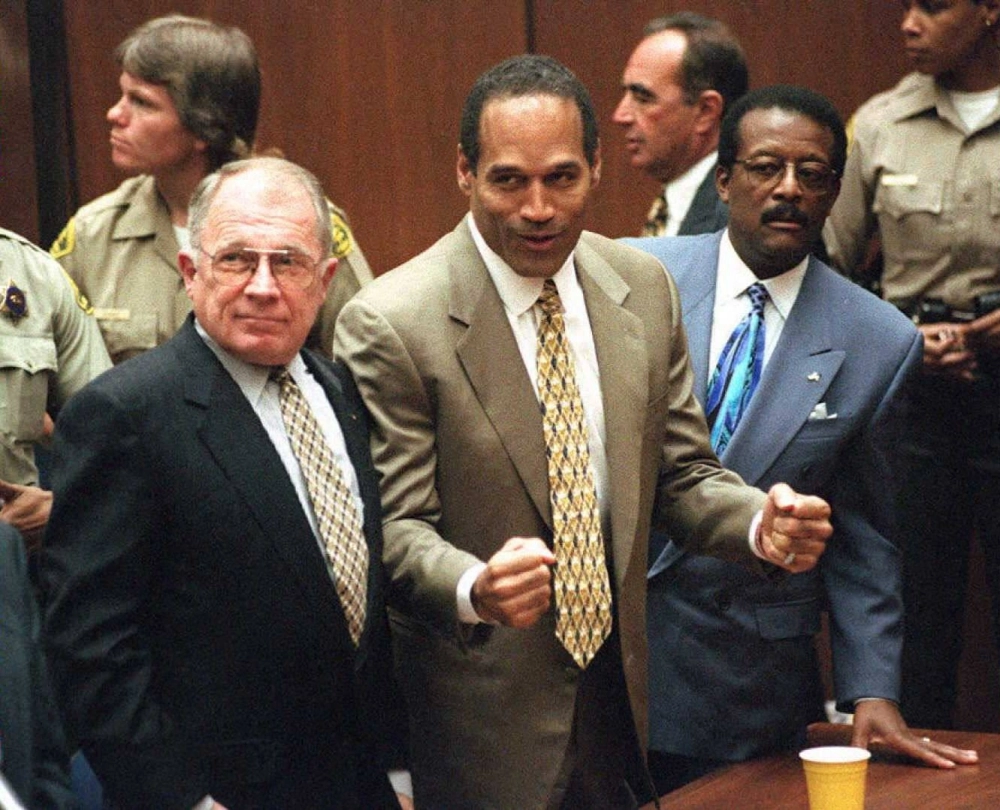 O.J. Simpson listens to the not guilty verdict after his murder trial with his attorneys F. Lee Bailey (left) and Johnnie Cochran Jr. (right) in Los Angeles in October 1995.   O.J. Simpson listens to the not guilty verdict after his murder trial with his attorneys F. Lee Bailey (left) and Johnnie Cochran Jr. (right) in Los Angeles in October 1995.