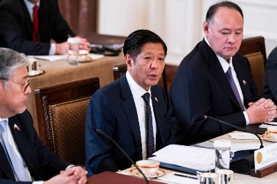 Philippine President Ferdinand Marcos Jr., (center) speaks during a meeting at the White House in Washington on Thursday. Philippine President Ferdinand Marcos Jr., (center) speaks during a meeting at the White House in Washington on Thursday.